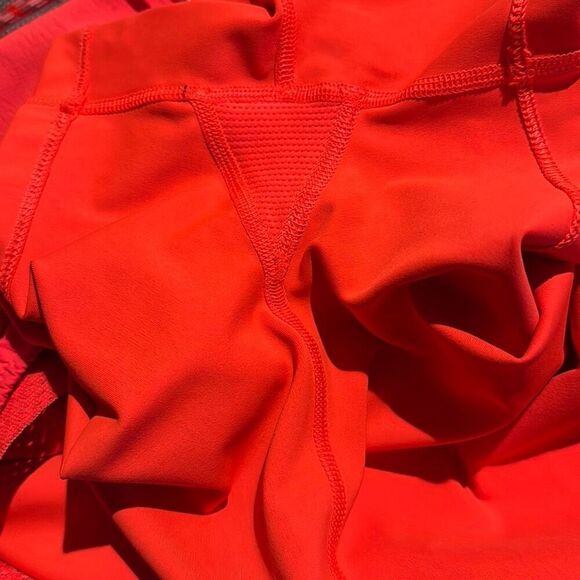 Athleta Trekkie Crest 2 in 1 shortie size 8 orange racing red - Picture 6 of 6